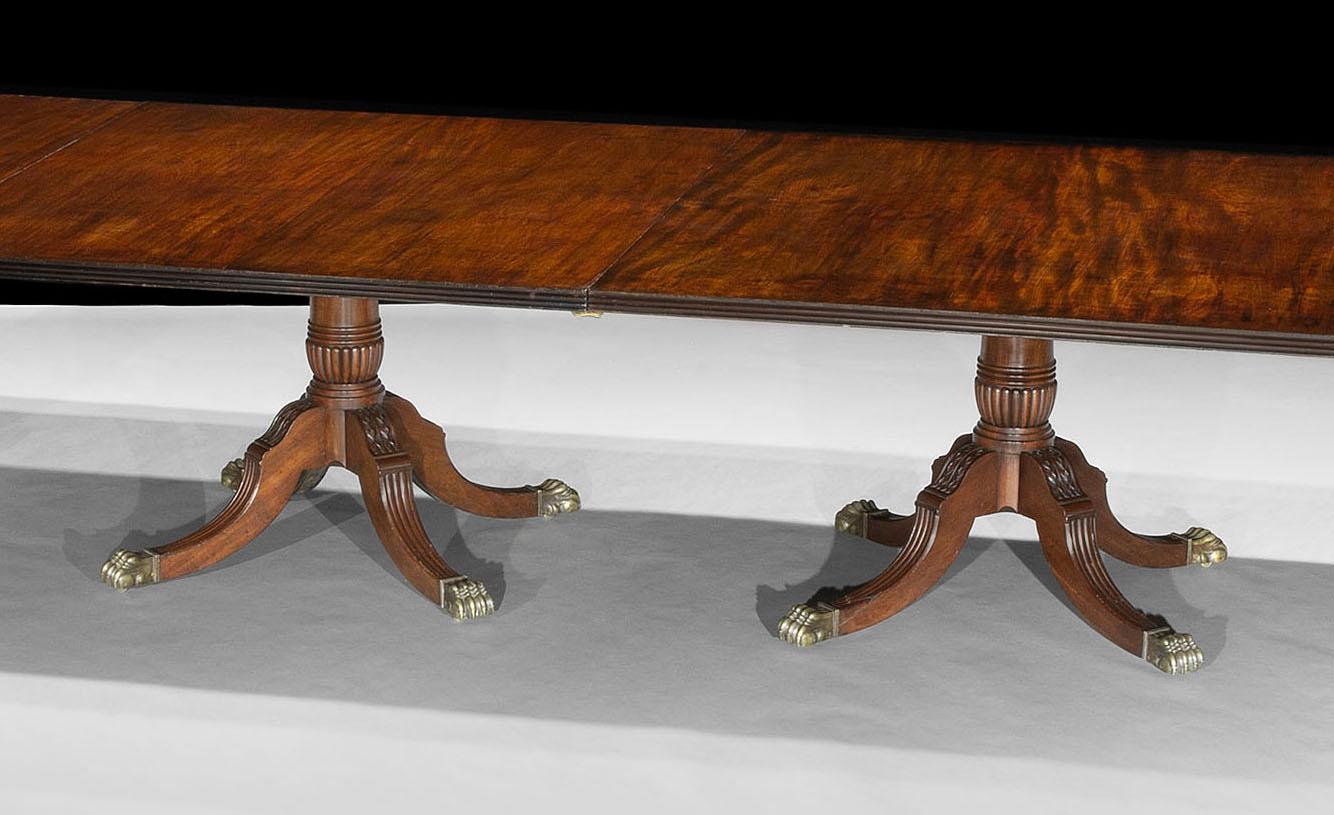 Carved A Large Irish Regency Mahogany Five Pillar Dining Table For Sale