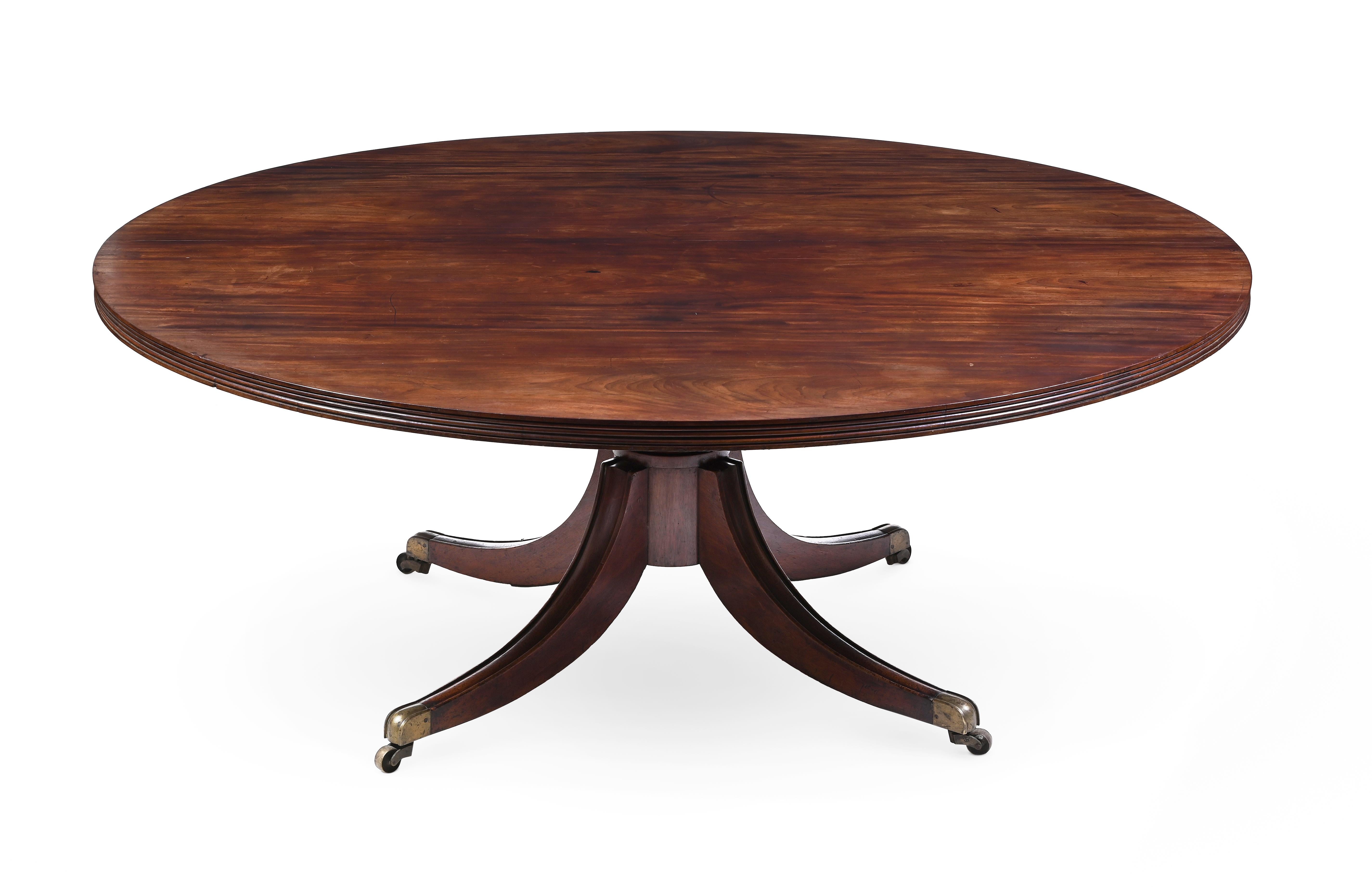 Turned A Large Irish Regency Mahogany Round Dining Table For Sale