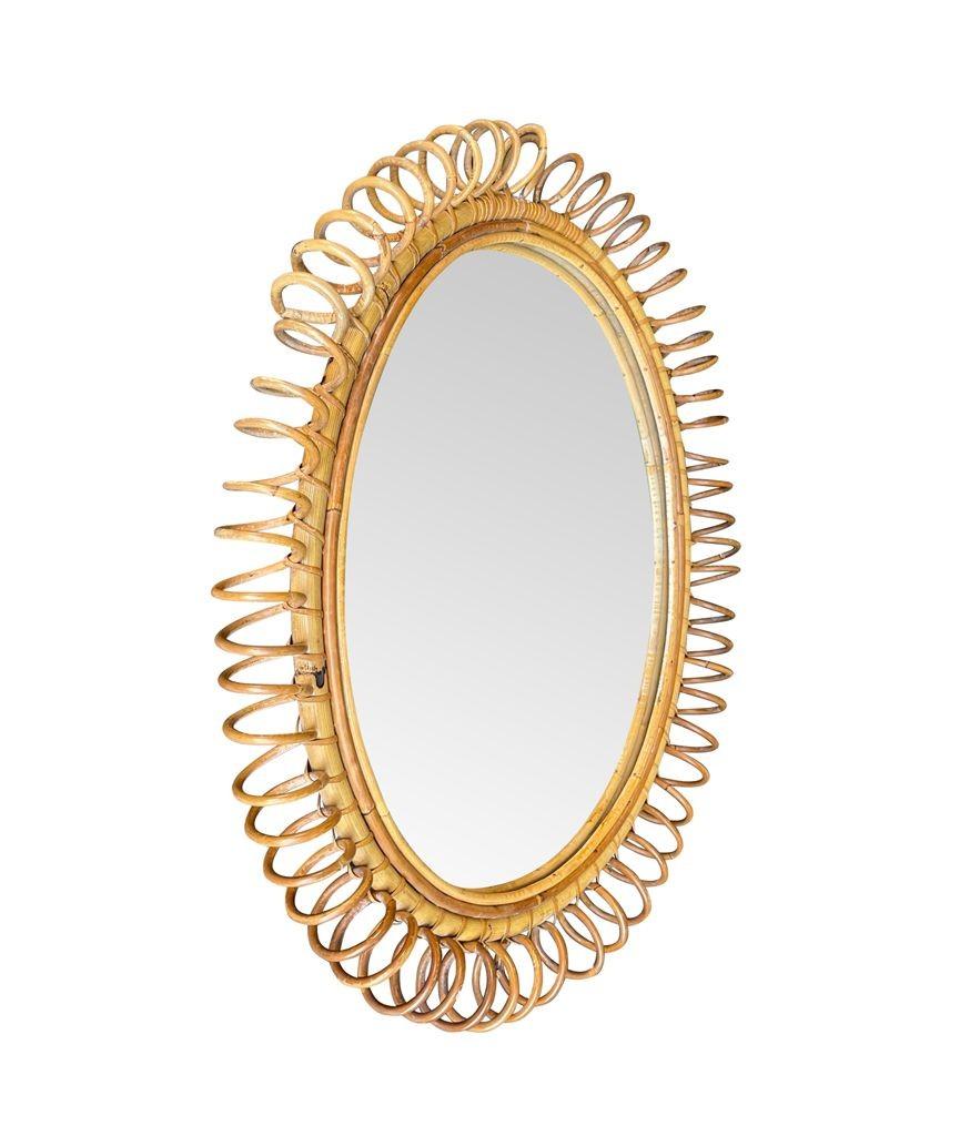 Mid-Century Modern A large Italian 1970s bamboo oval mirror with spiral frame by Franco Albini