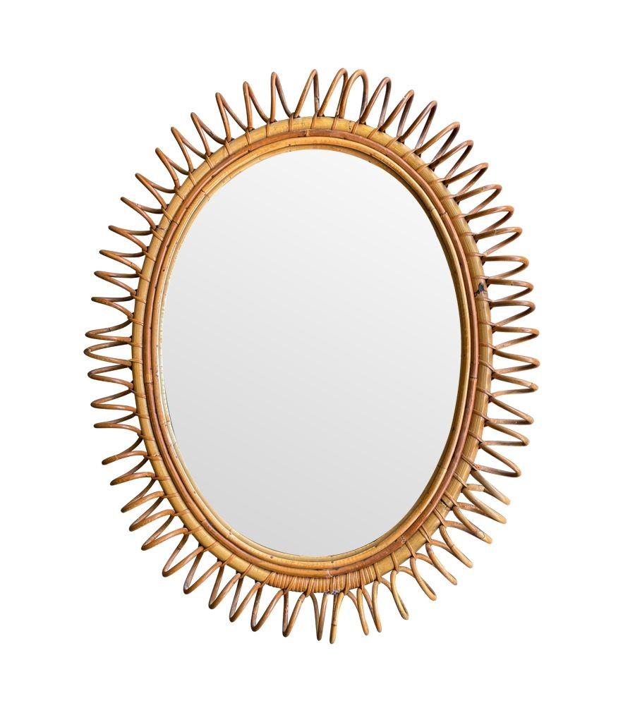 A large Italian 1970s bamboo oval mirror with spiral frame by Franco Albini In Good Condition In London, GB