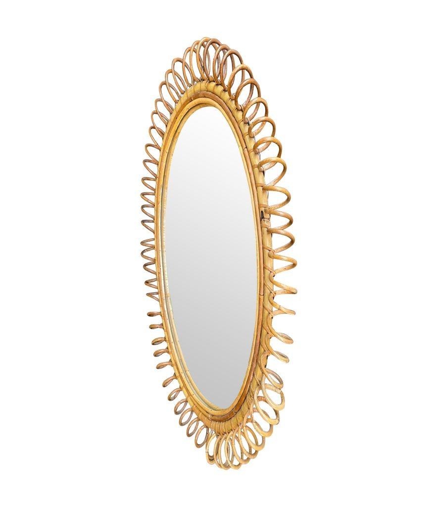 A large Italian 1970s bamboo oval mirror with spiral frame by Franco Albini 2