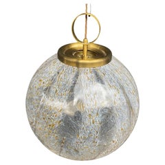 A large Italian 1970s Murano glass pendant light with brass hanging detail