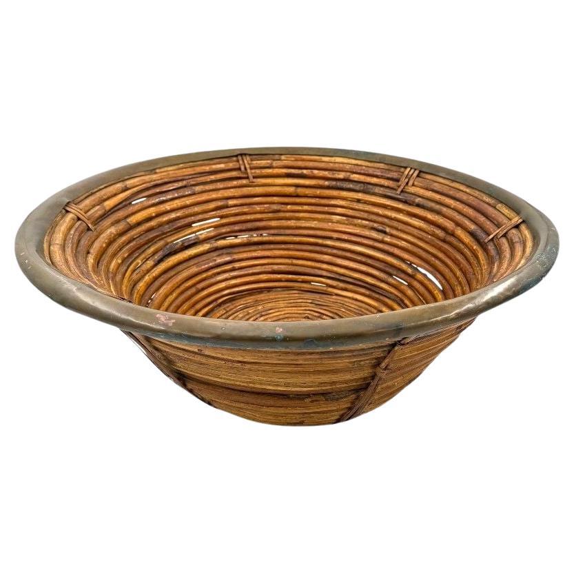 A large Italian 1970s woven bamboo bowl with brass rim For Sale