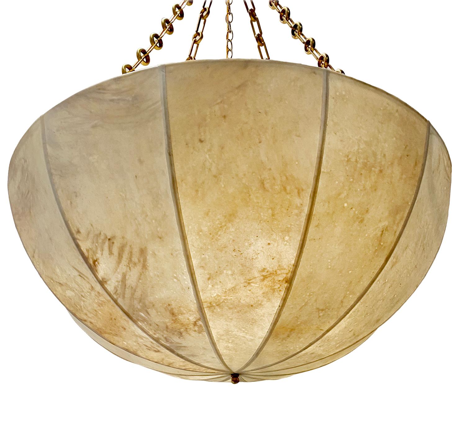 A circa 1980's Italian hand made parchment light fixture with 10 interior lights.

Measurements:
Drop: 48