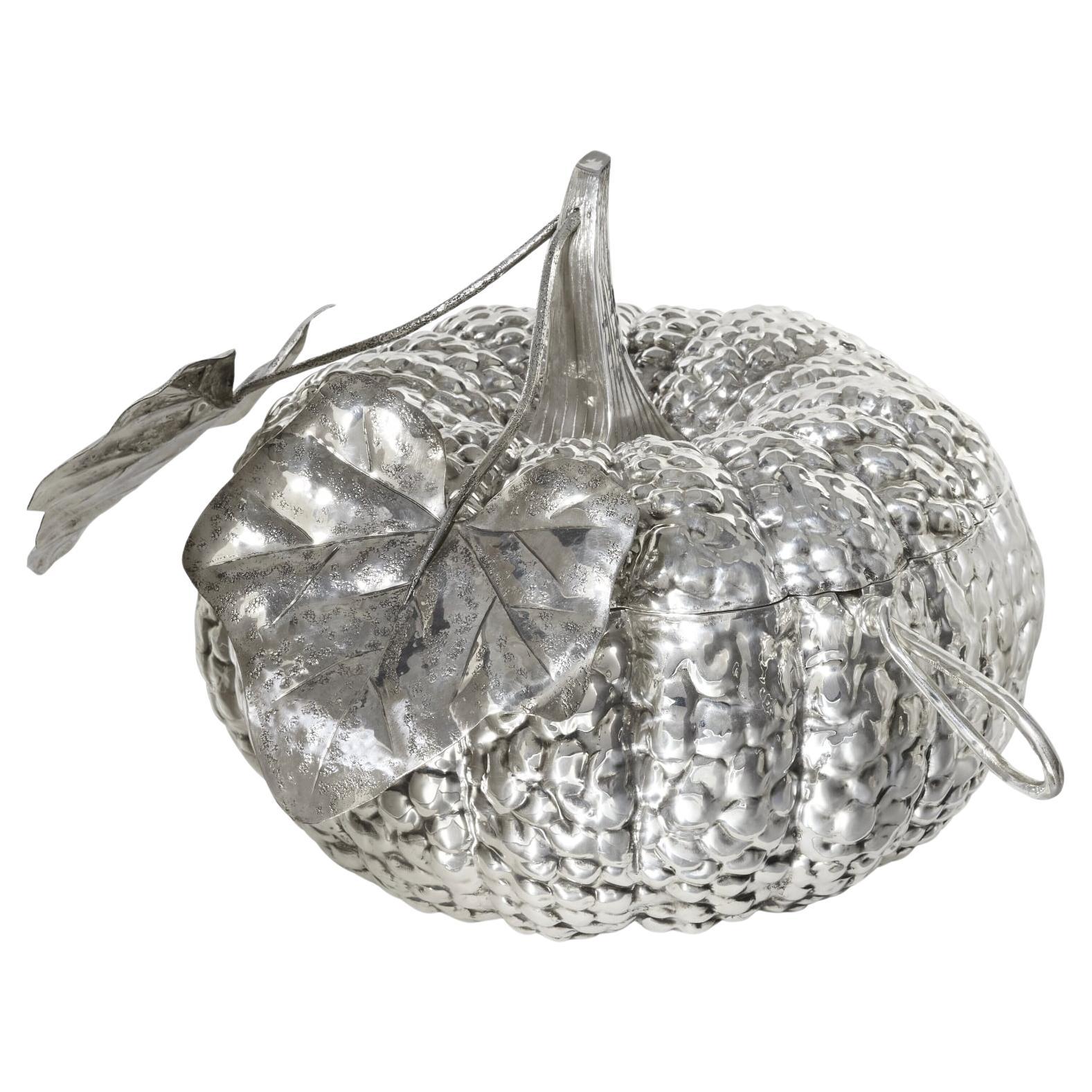 A Large Italian Silver Pumpkin Soup Tureen And Ladle by Mario Buccellati, Milan, 20th Century.

This exceptional Mario Buccellati silver pumpkin soup tureen is a remarkable display of masterful Italian silversmithing. Crafted with meticulous