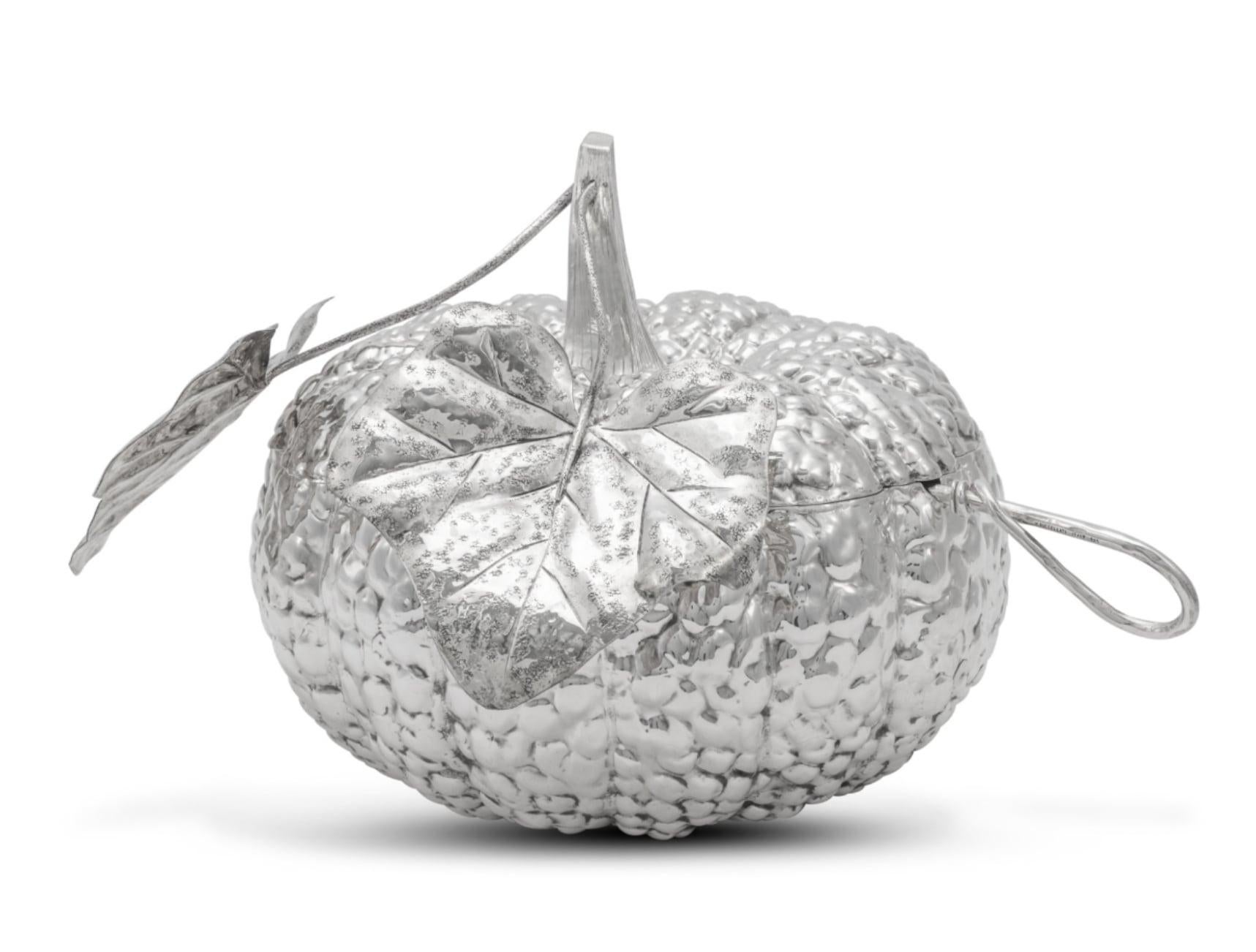 A Large Italian Silver Pumpkin Soup Tureen And Ladle by Mario Buccellati, Milan, 20th Century.

This exceptional Mario Buccellati silver pumpkin soup tureen is a remarkable display of masterful Italian silversmithing. Crafted with meticulous