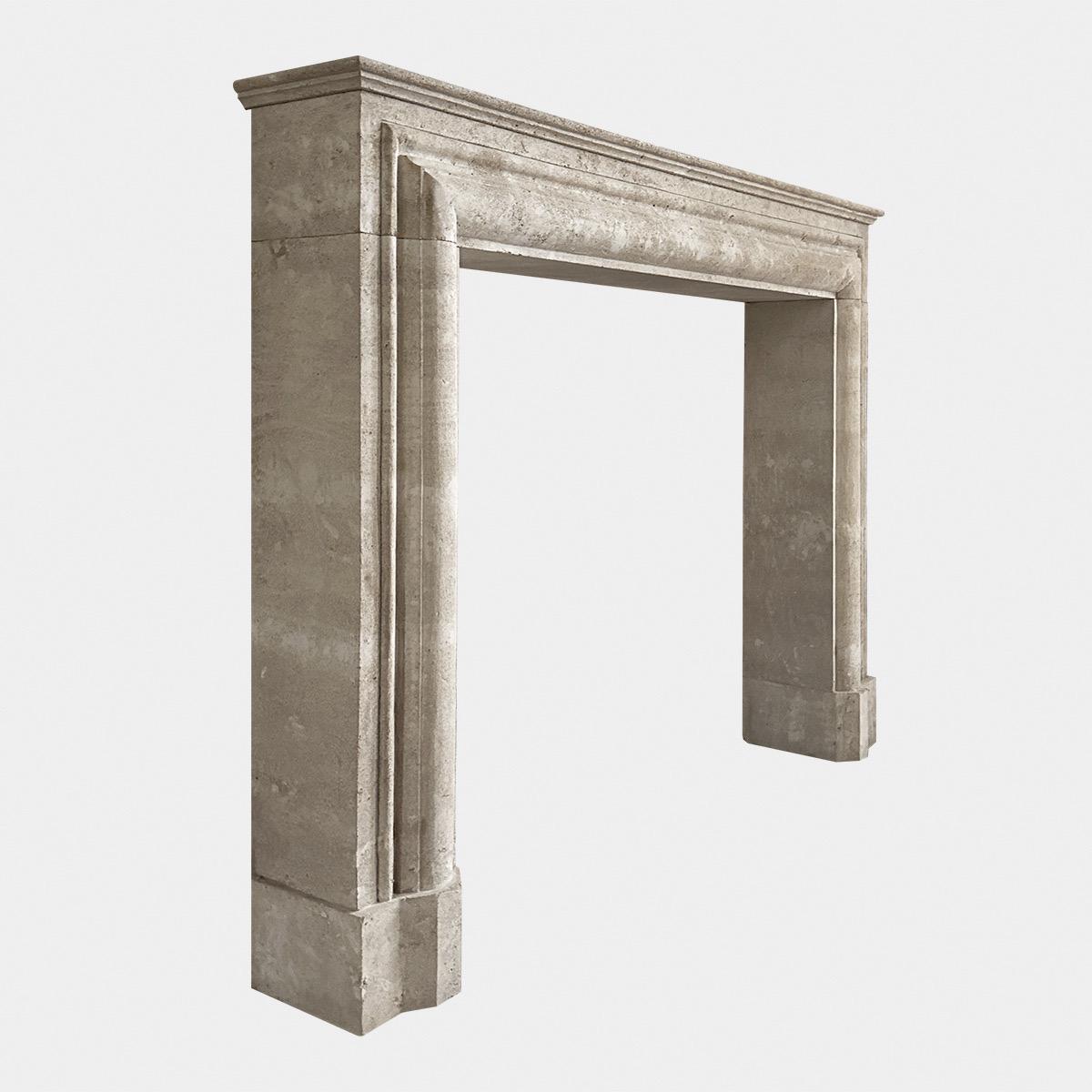 A large Italian Bolection fireplace in Italian Travertine stone. Carved in generous proportions, with a graduating bolection profile, with deep jambs and header. Stood on shaped foot blocks, with a simple mantle above. Can also be used without the