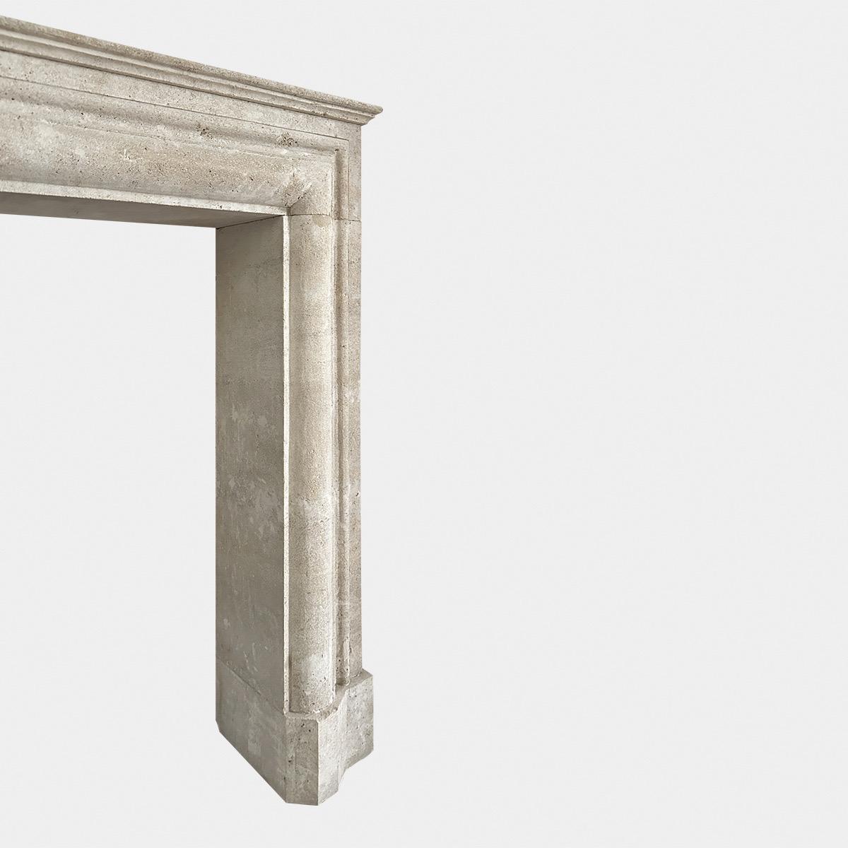 A large Italian Travertine Stone Bolection Fireplace Mantel  In Good Condition For Sale In London, GB