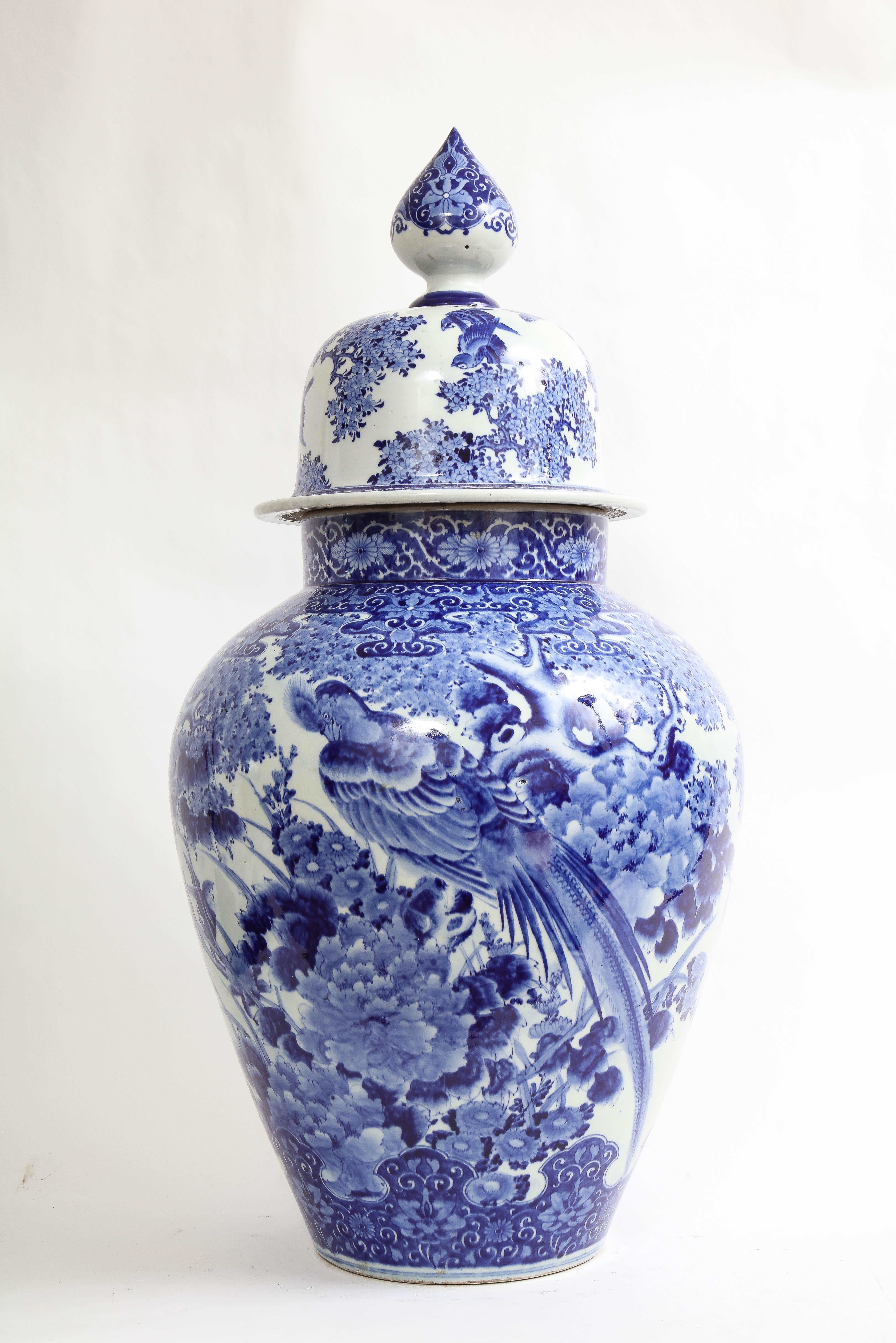Large Japanese Blue and White Covered Vase with Pheasant and Flower Decoration In Good Condition For Sale In New York, NY