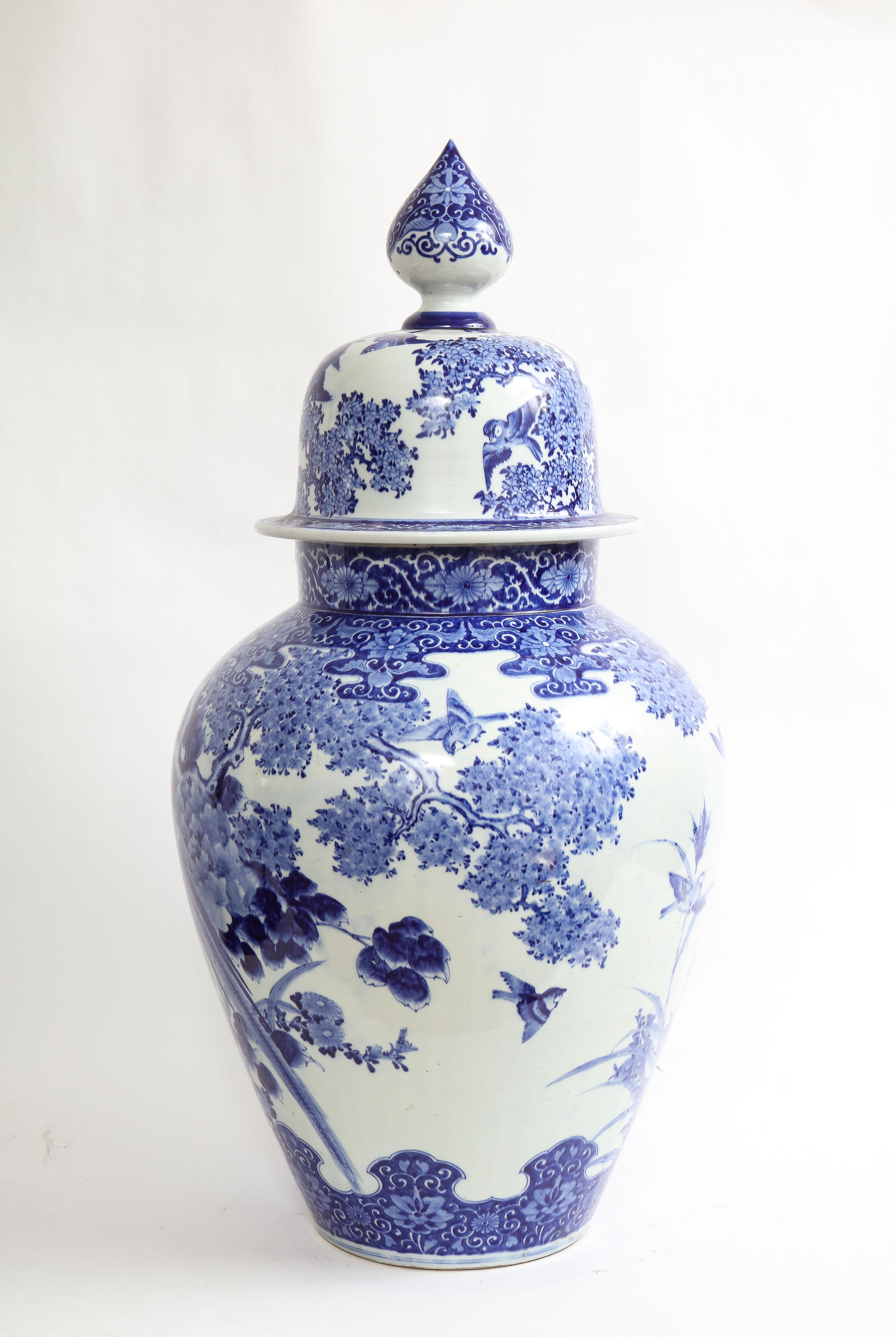 Porcelain Large Japanese Blue and White Covered Vase with Pheasant and Flower Decoration For Sale
