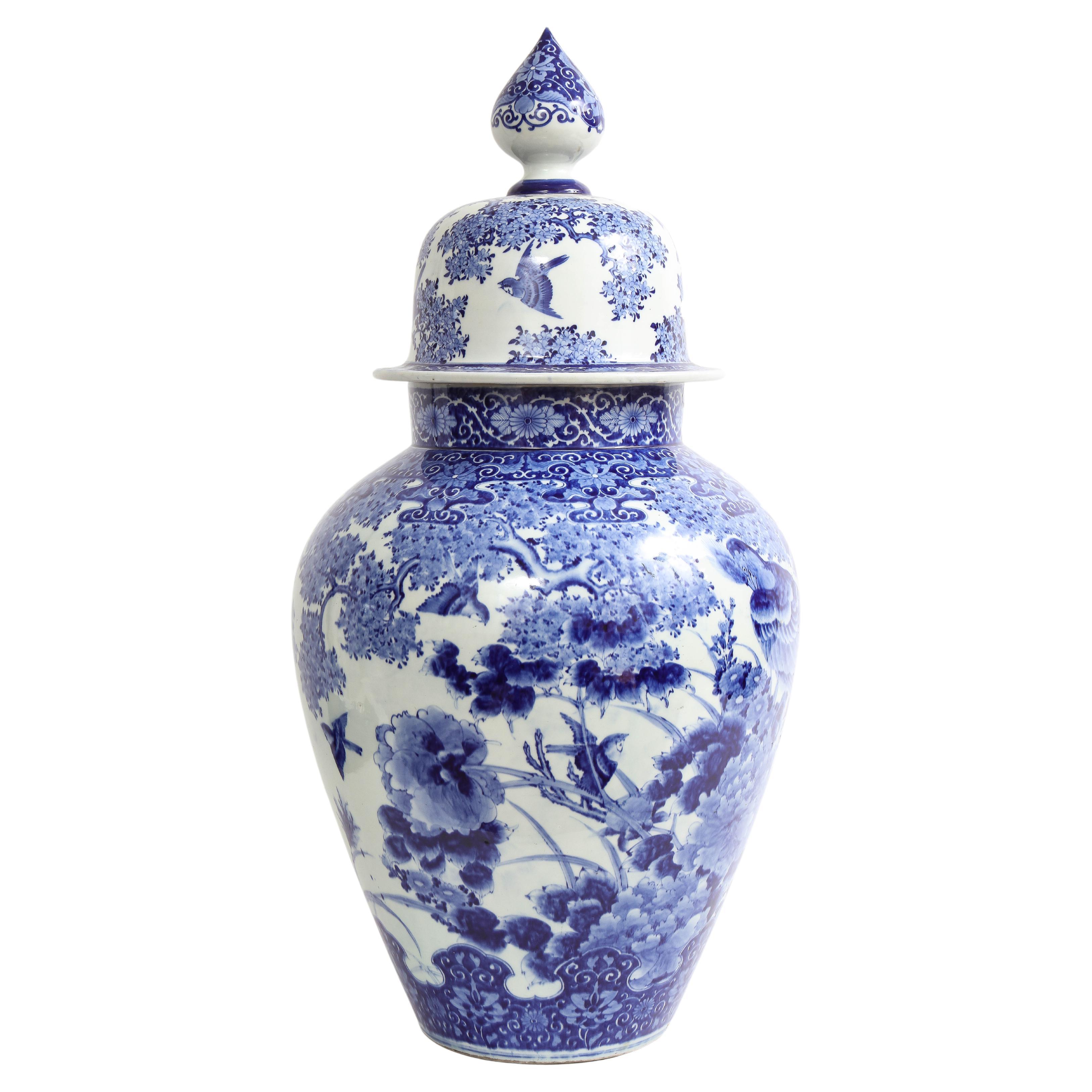 Large Japanese Blue and White Covered Vase with Pheasant and Flower Decoration For Sale