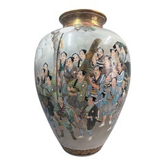 A large Japanese Satsuma baluster Vase with Daimyo procession