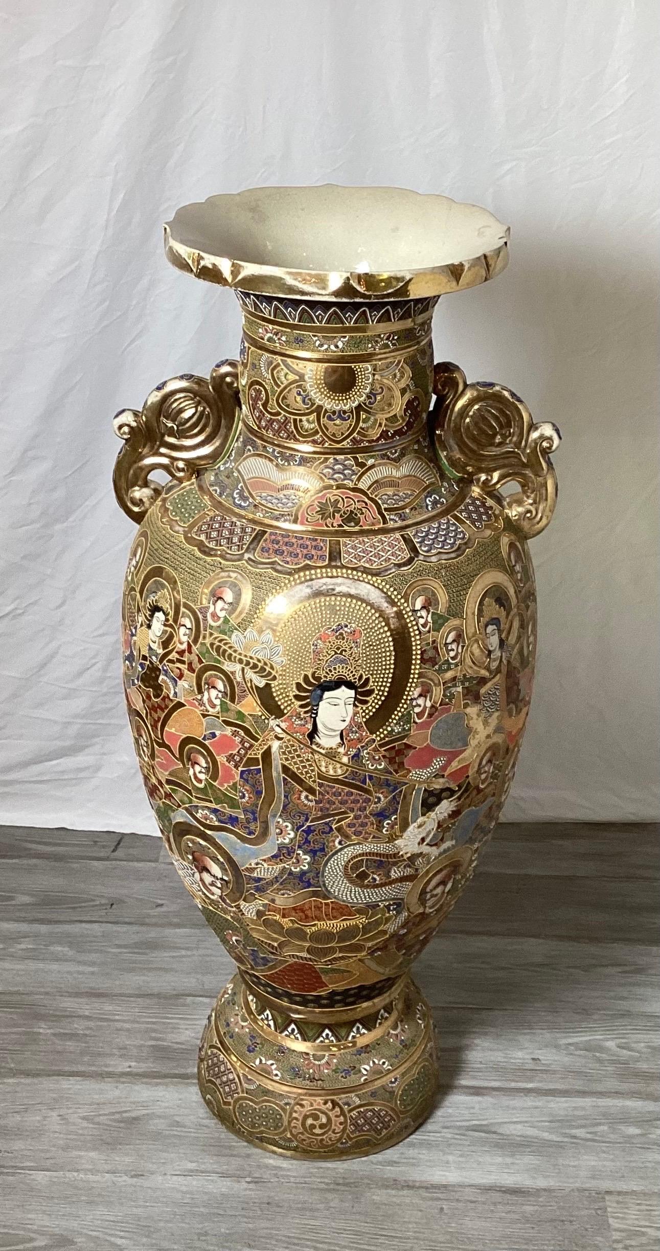 A large hand painted Japanese Satsuma palace vase.  All one piece with a bulbous form with detailed enamel with no fadin, Decorated with a Japanese goddess, dragon and elaborate gilt highlights.  Some minor wear to high spots, as expected. 