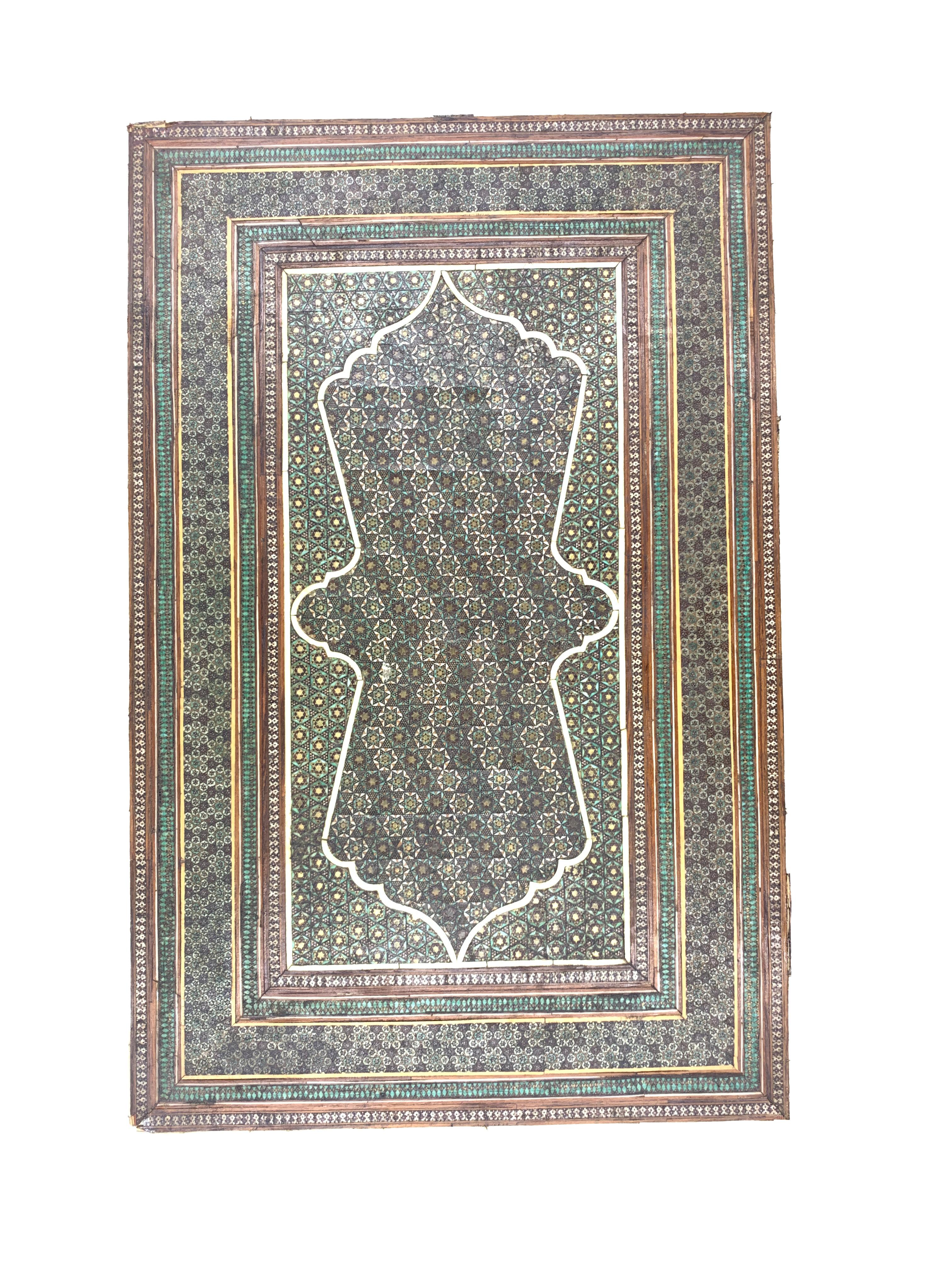 Beautiful example of Persian calligraphy and craftsmanship, micro mosaic design 19th-20th century Katamkari box, of rectangular form, with rectangular panels to lid and body containing geometric shapes.
 