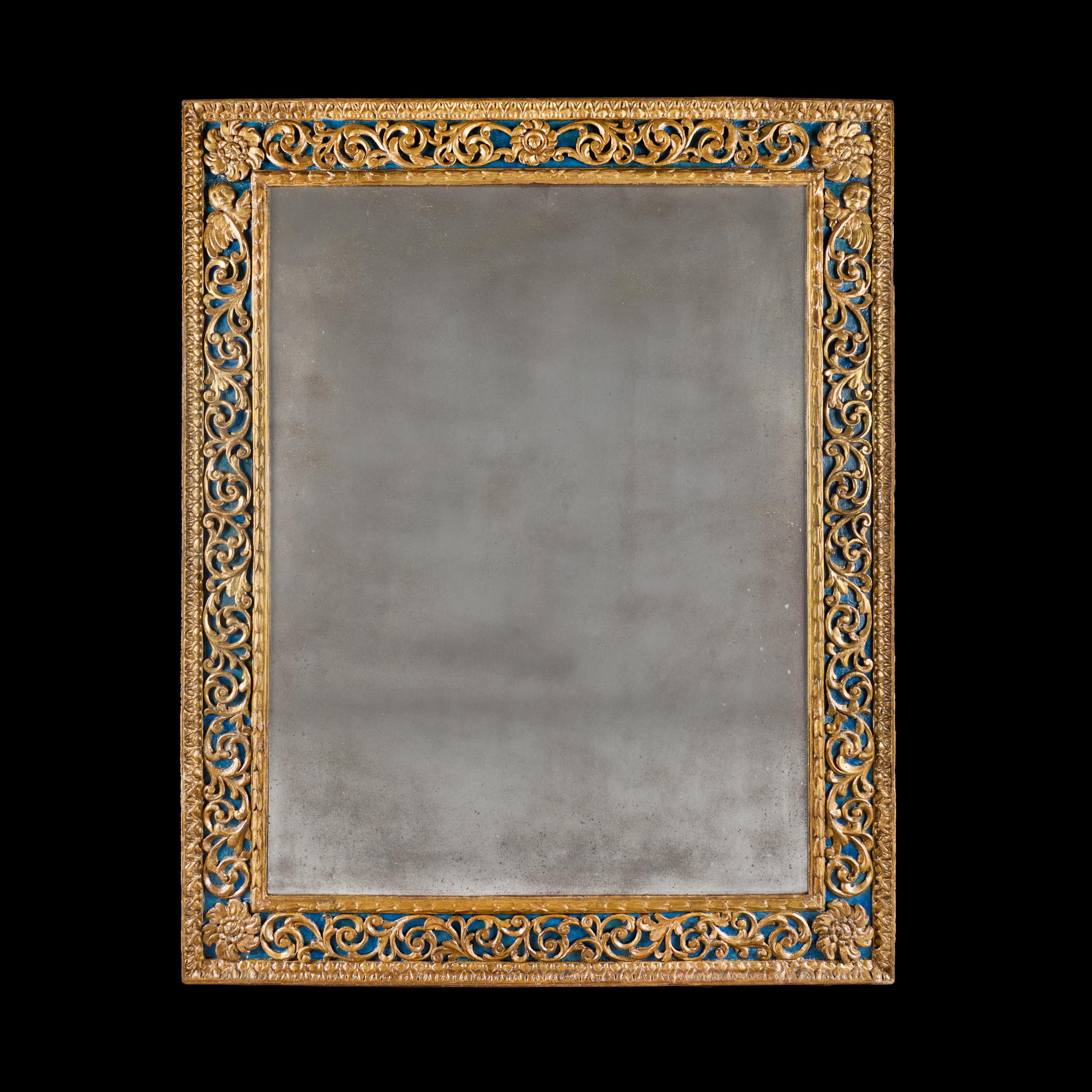 Italia, hacia 1700

Fino espejo rectangular de finales del siglo XVII decorado sobre fondo azul con arabescos foliados entrelazados, cuatro páteras en los márgenes y máscaras aladas en el marco superior.

Altura 152,00 cm
Anchura 122,50