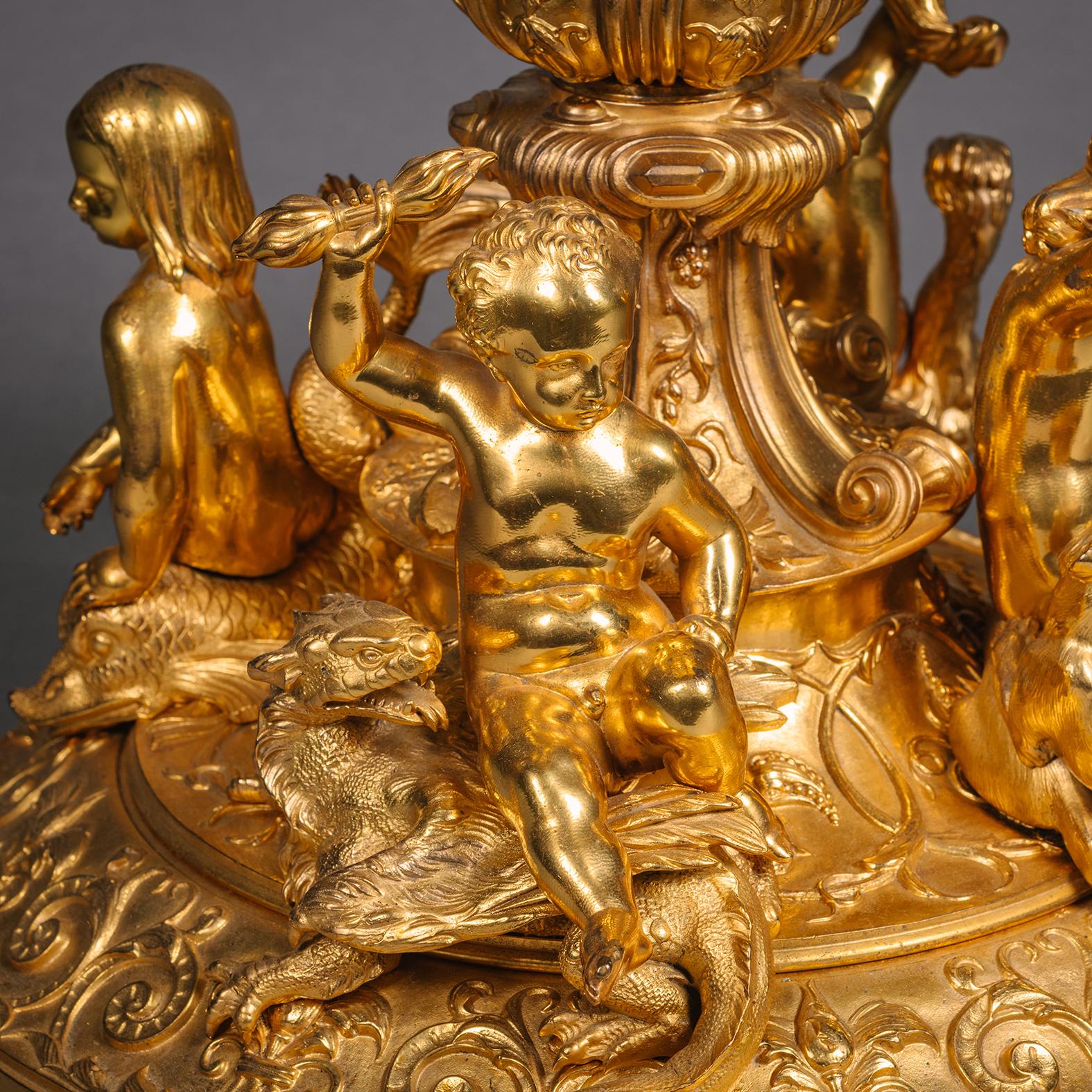 A Large Louis Philippe Period Gilt-Bronze Table Centrepiece or Corbeille (Fruit Basket). Attributed to Guillaume Denière (1815-1903), Paris, Circa 1840.

The four sculptural figures of seated children are attributed to Jean-Jacques Feuchère