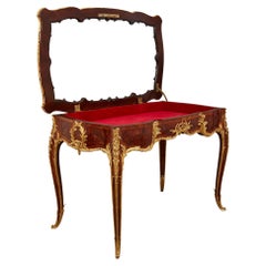 Used A large Louis XV style ormolu mounted marquetry table vitrine by Linke