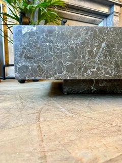 A Large Low Coffee Table In Grey Tessellated Marble By Maitland Smith