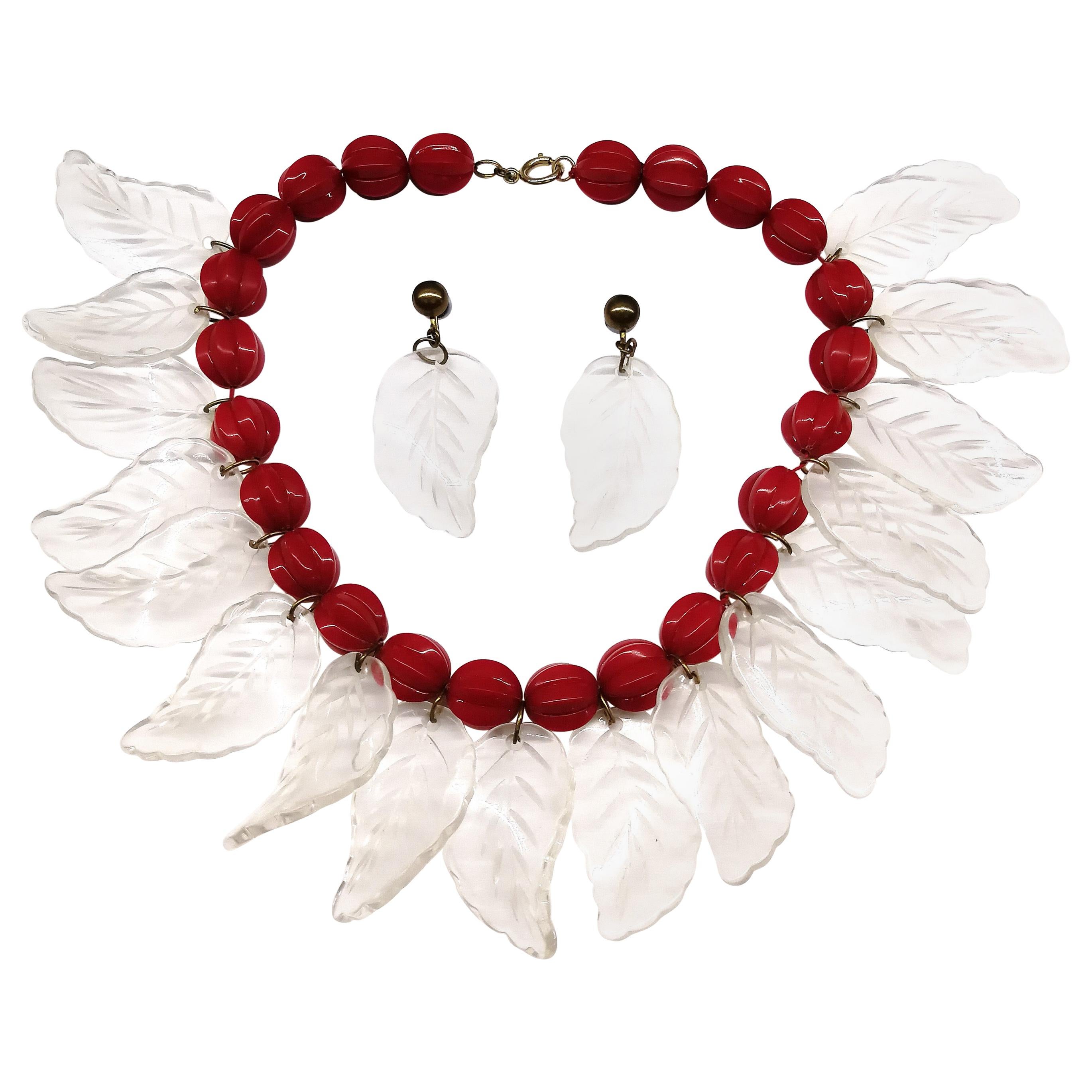 A large lucite 'leaf' necklace and earrings, USA, late 1940s