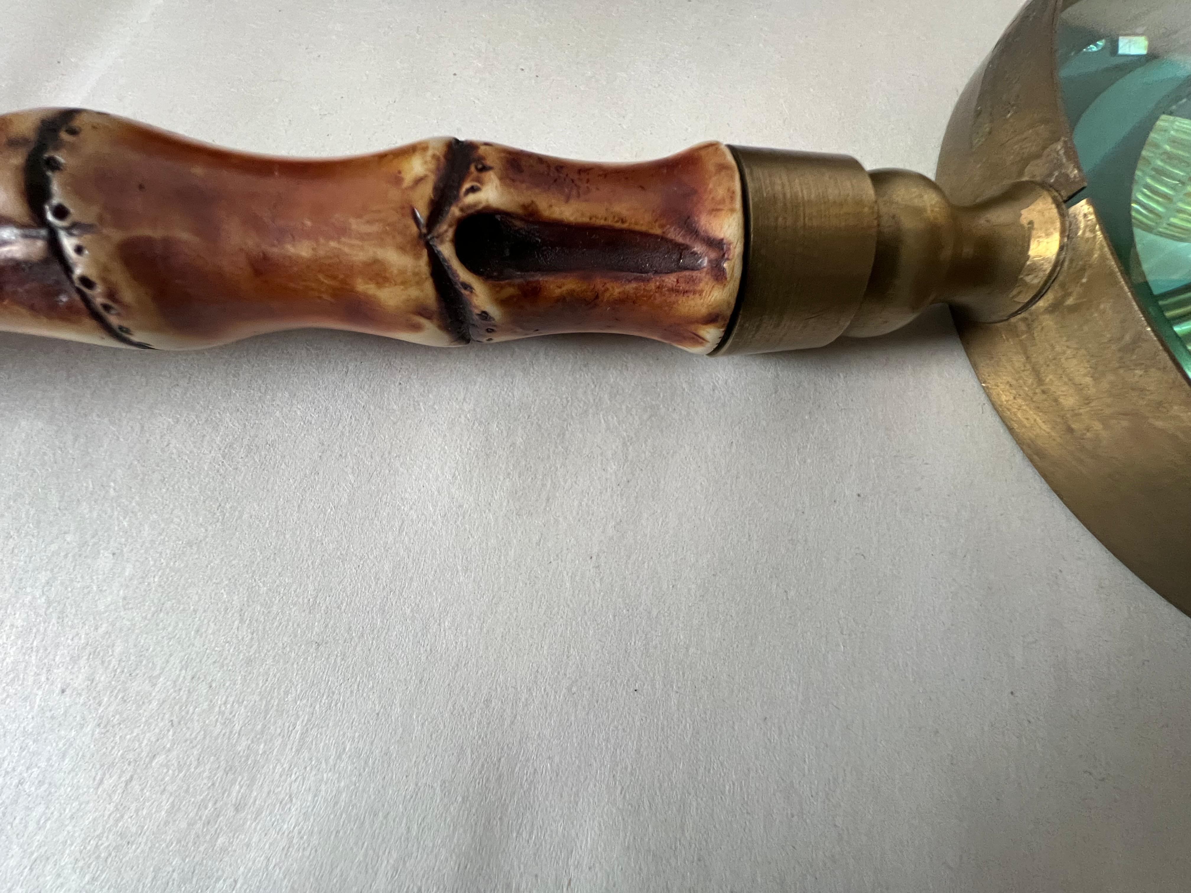 A beautiful and heavy, bamboo handle, brass magnifying glass. Ca' 1950's.