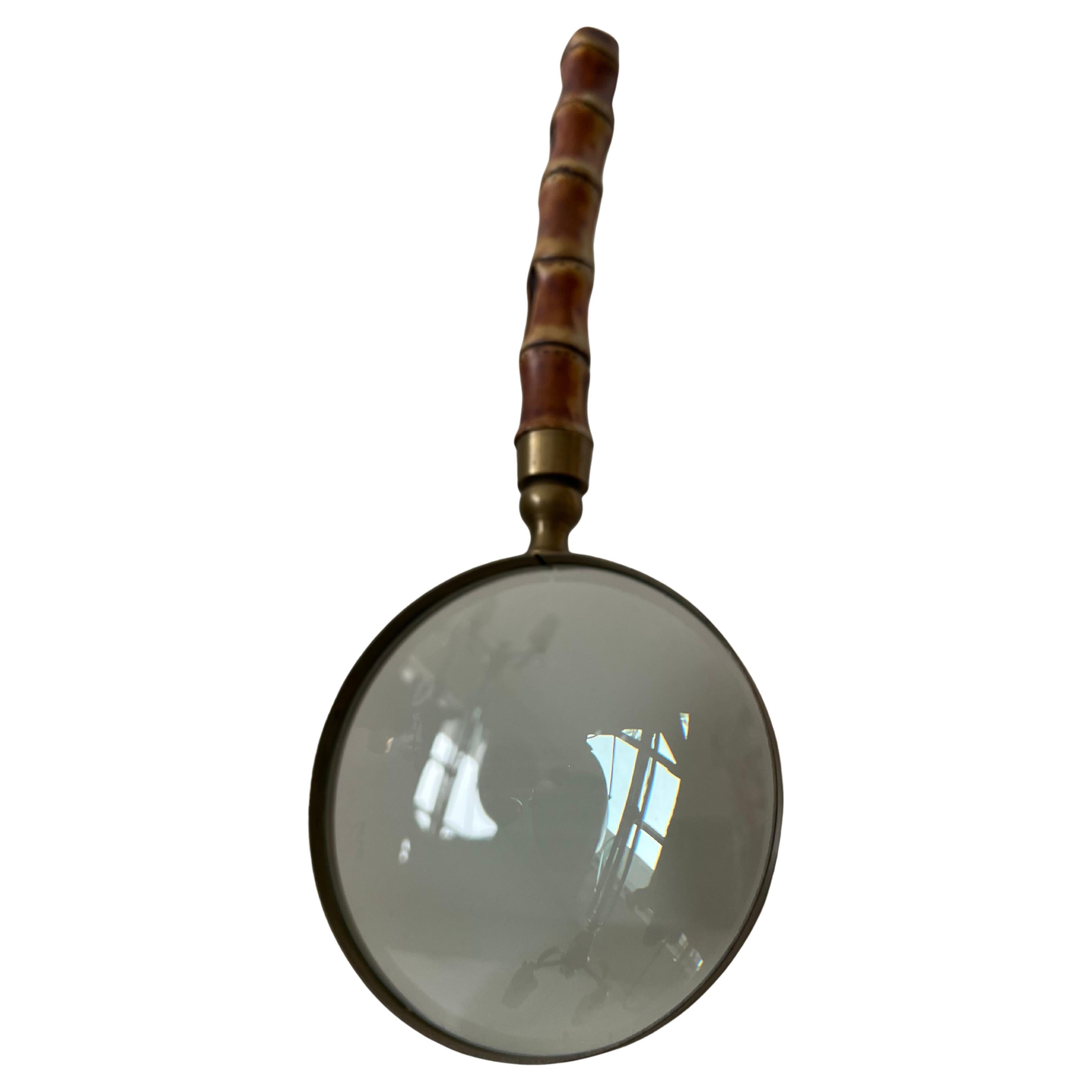 A Large Magnifying  Glass With Bamboo Handle