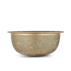A Large Mamluk Engraved Brass Basin, Egypt, Late 15th-Early 16th Century
