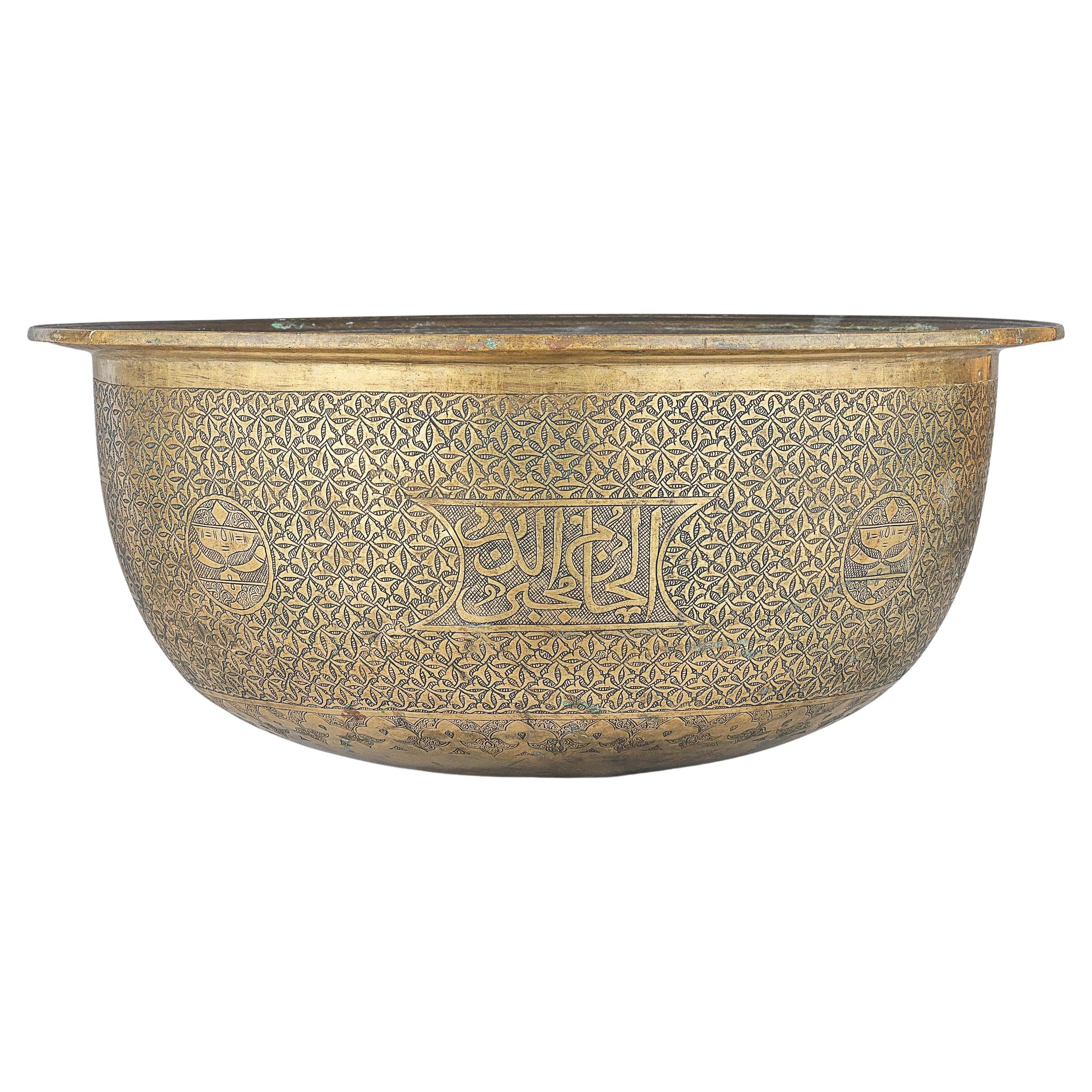 A Large Mamluk Engraved Brass Basin, Egypt, Late 15th-Early 16th Century For Sale