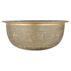 A Large Mamluk Engraved Brass Basin, Egypt, Late 15th-Early 16th Century