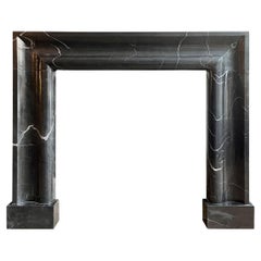 Large Marble Bolection Fireplace Mantel in Nero Marquina
