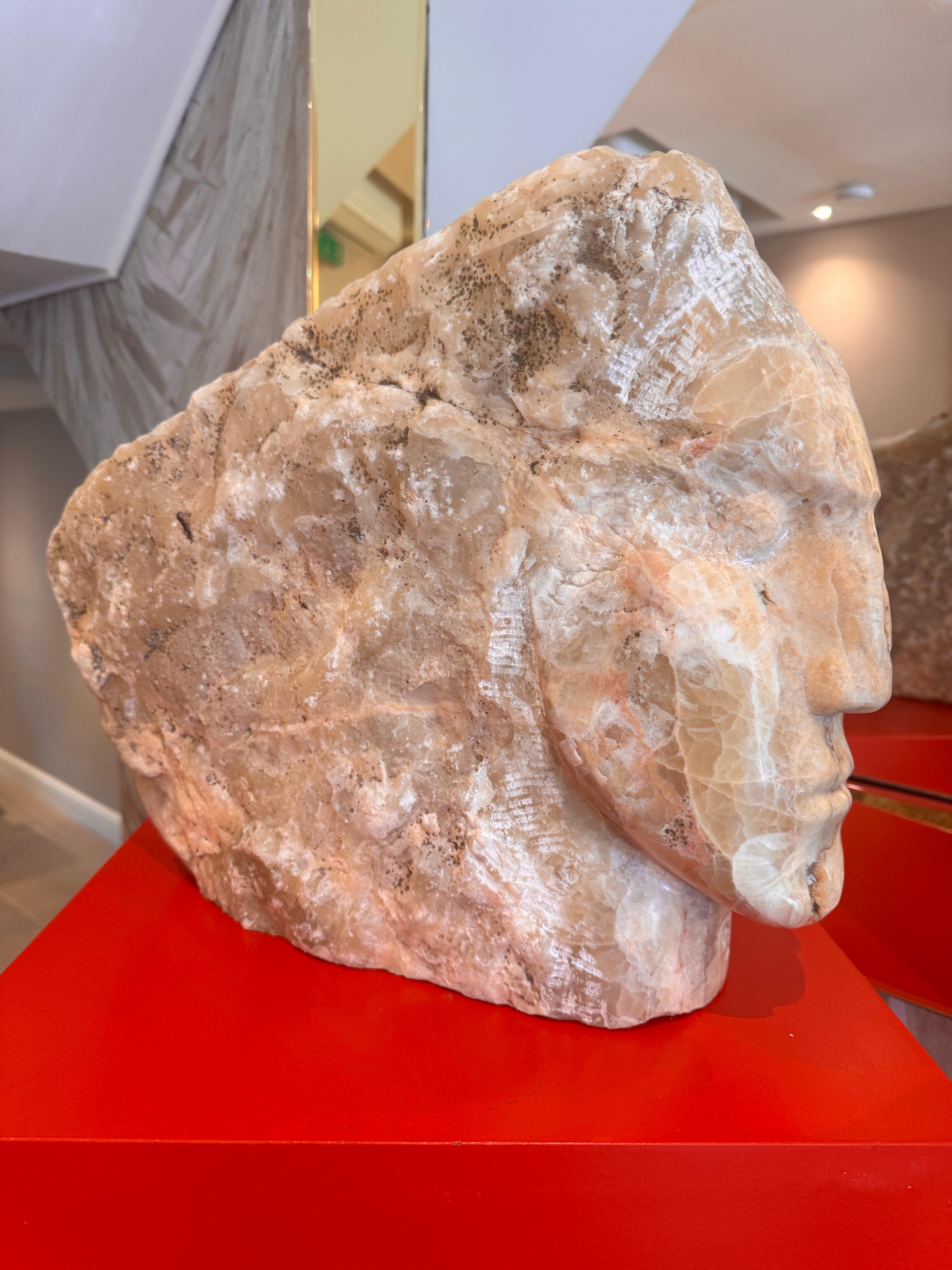 An exquisite hand chiselled Italian marble head sculpture in abstract form in the style of the world renowned British artist Emily Young . 