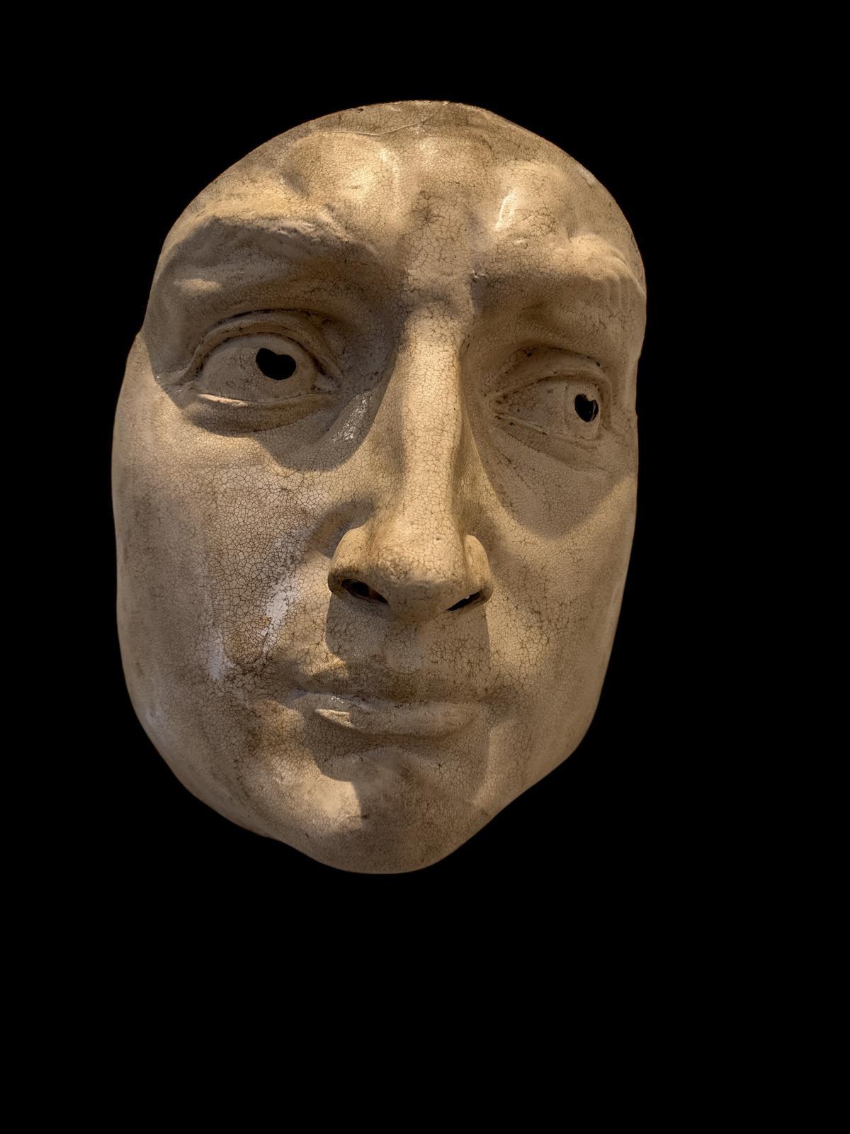 A large mask by Agostino Dessi depicting Michaeangelo's David, papier-mâché, signed to the reverse.

Agostino Dessì (b. 1952) is a renowned Italian mask maker from Sardinia, celebrated for his handcrafted theatrical masks inspired by Commedia