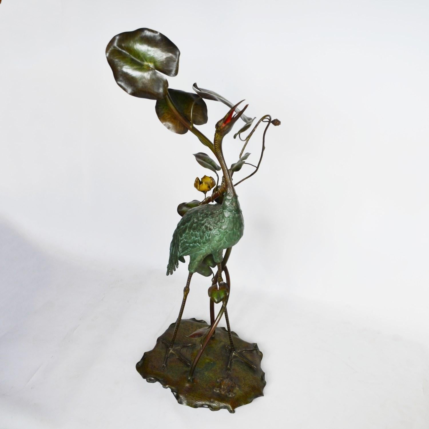 A large early 20th century, Japanese bronze model of a Stork. Cold painted and patinated bronze, with flower and plant detail and a bronze Frog to base. Unsigned.

Dimensions: H 125cm, W 45cm, D 36cm

Origin: Japanese

Date: circa 1910

Item number: