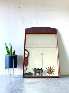 A large Mid Century Modern Lane First Edition wall mirror.