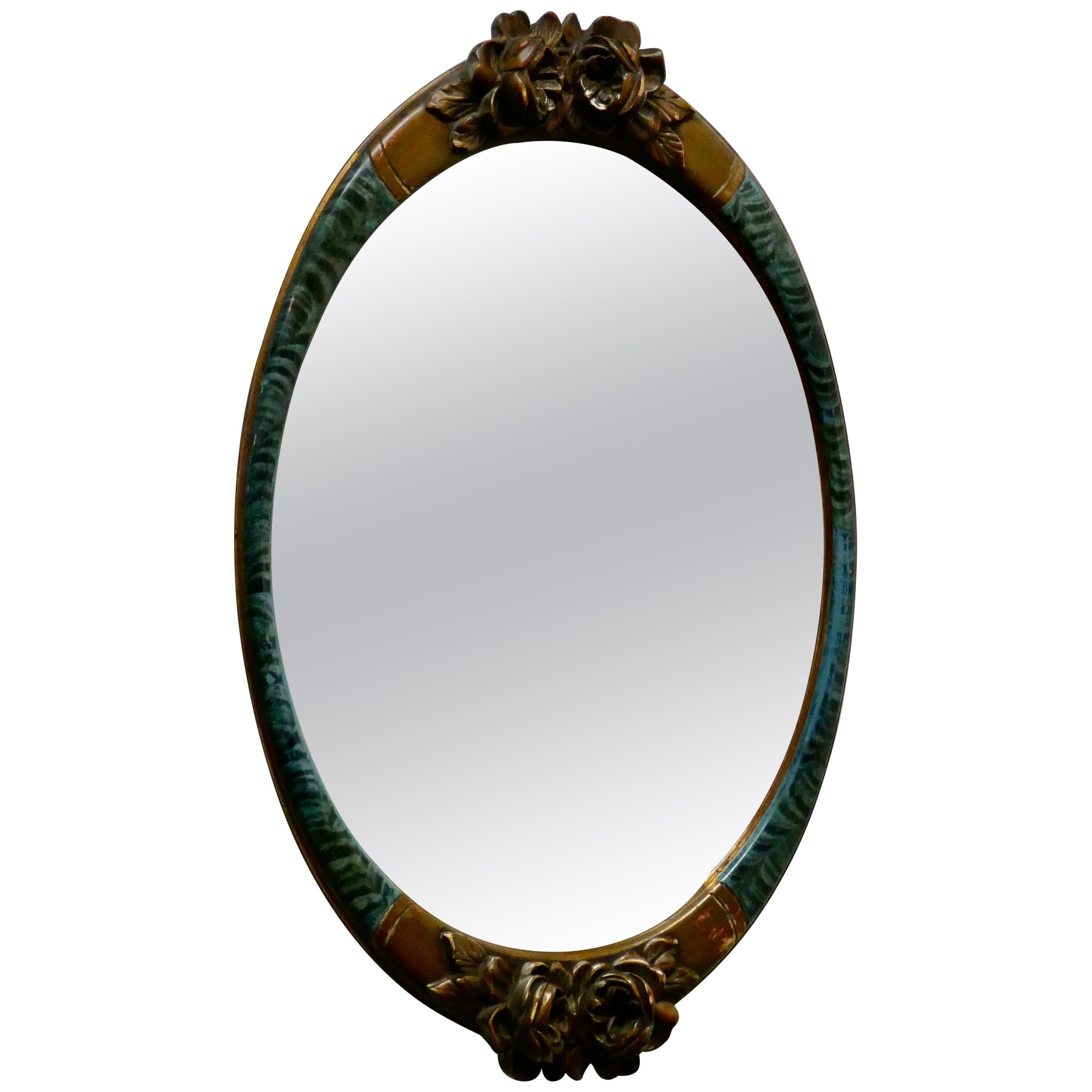 Large Mirror in Oval Ormolu Frame