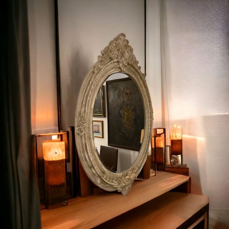A large modern but antique looking French Rococo Style wall Mirror. A beautiful ornate frame that fits with any style of decor

H: 150 cm
w: 110 cm