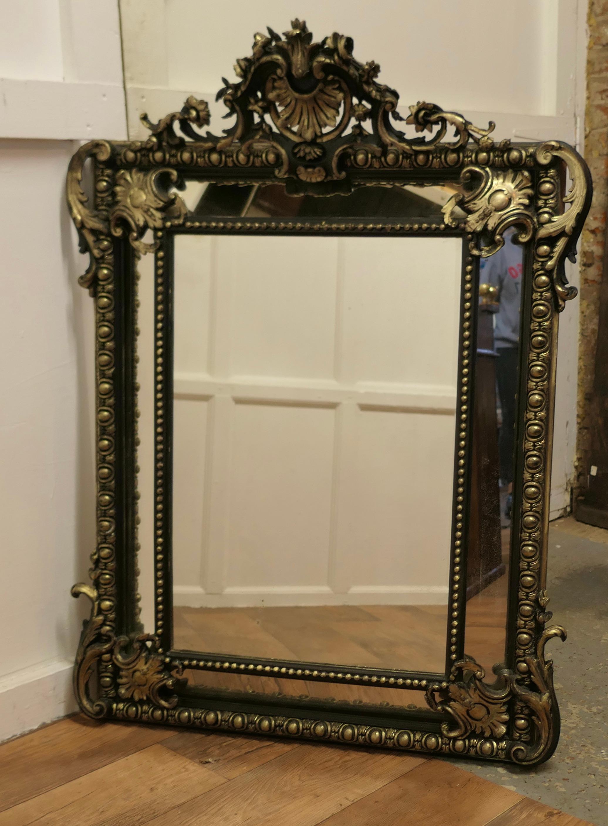 A Large Napoleon III French Cushion Mirror

This is an exquisite piece, the centre Glass is Framed with smaller angled mirrors all around and the Black and Gold Frame is decorated with Acanthus Leaves
The Mirrors are all original, the frame is very