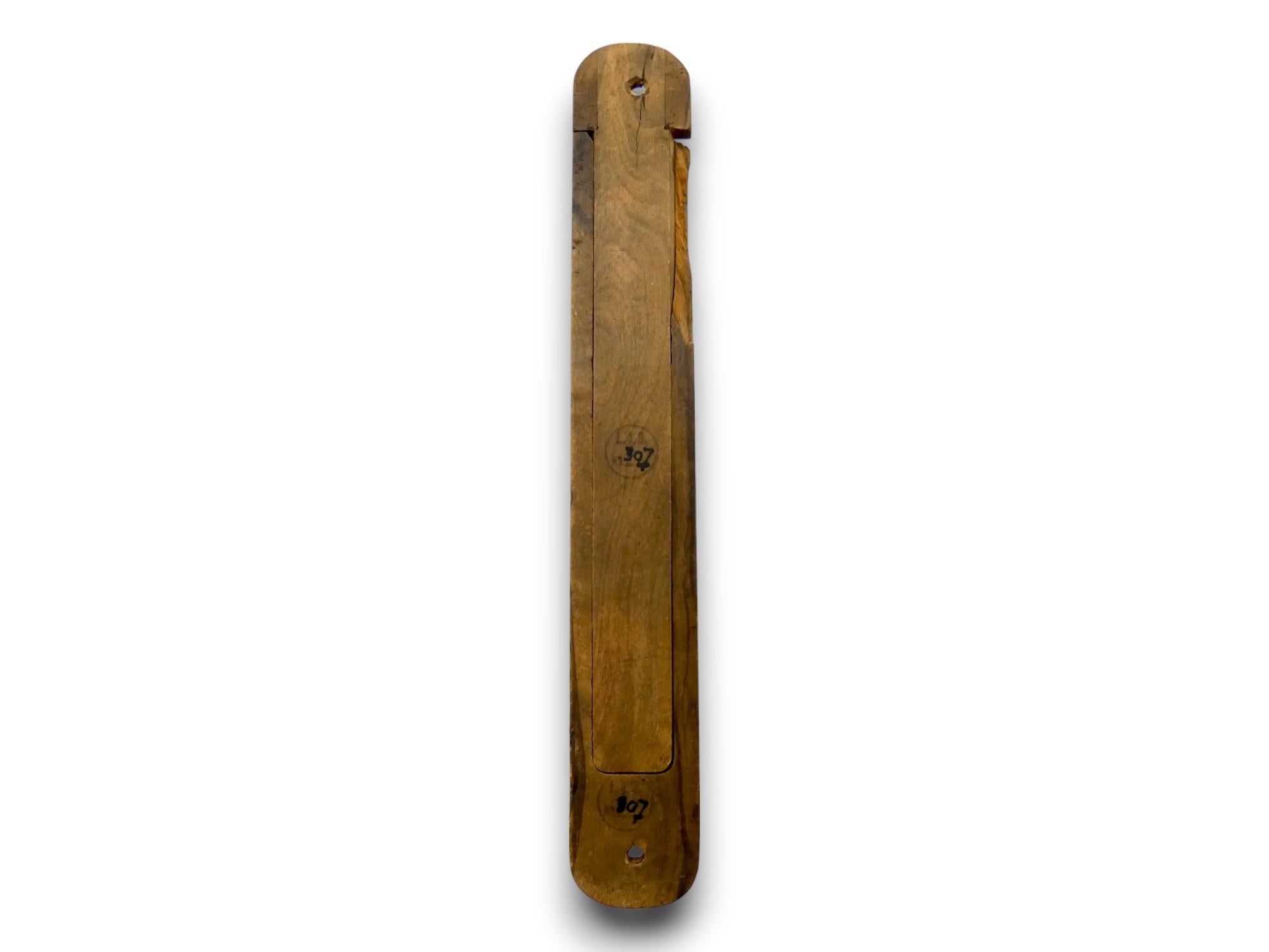 A  Very Rare Large Olivewood Mezuzah Case Made in Jerusalem Circa 1890.

Olive wood can be found in many areas of the world today but it is native to the Mediterranean region and considered to be of a higher standard of wood for various reasons.