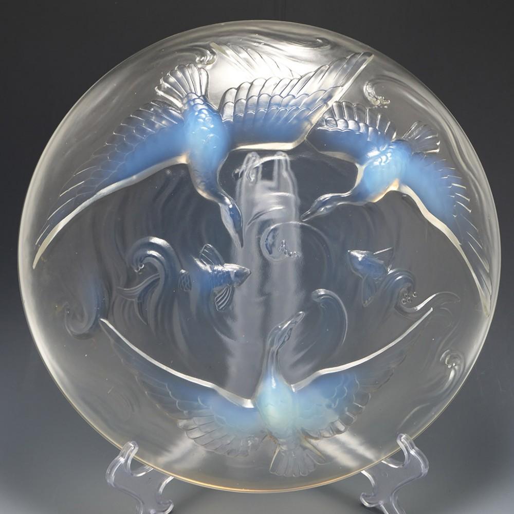 A Large Opalescent Verrerie D'Andelys Glass Charger, c1935

Additional information:
Date : Circa 1935
Period : French Republic
Marks :Verlys, France, moulded within the central well
Origin :Les Andelys, Eure, France,
Colour : Polished clear and