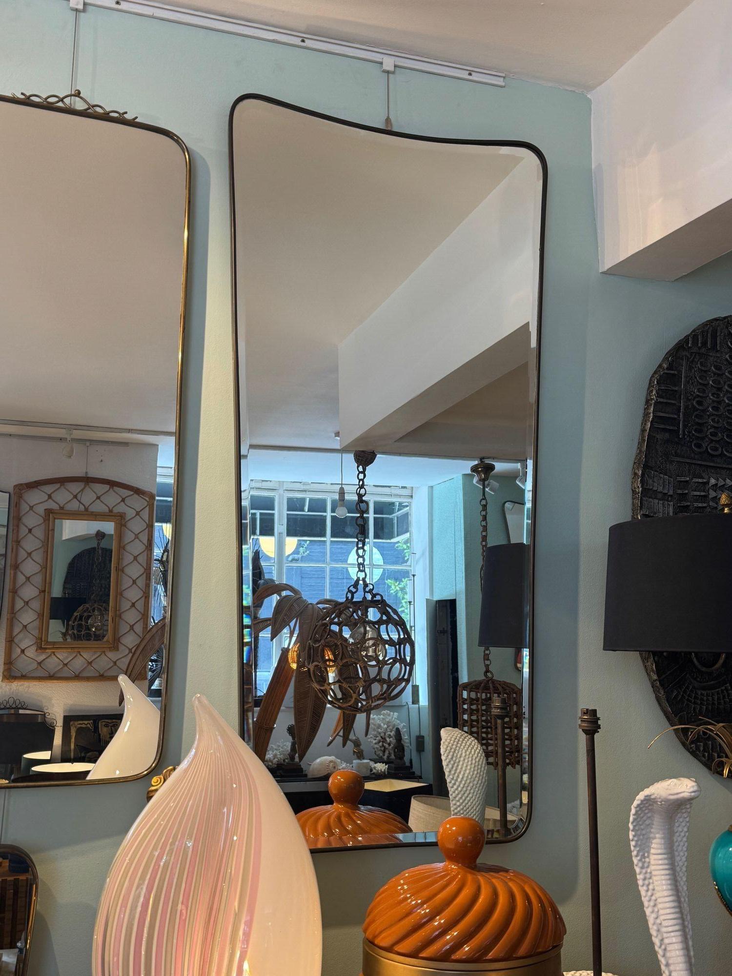 A large original 1950s Italian shield mirror with For Sale 5
