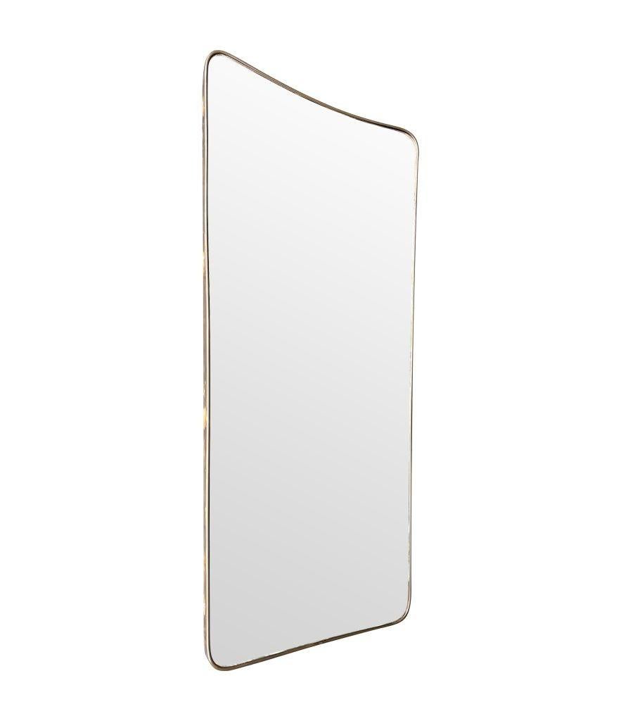 A large original 1950s Italian shield mirror with In Good Condition For Sale In London, GB