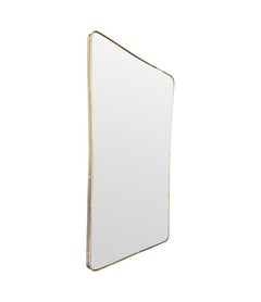 Grand miroir italien des années 1950, encadré de laiton, avec plaque biseautée d'origine.
