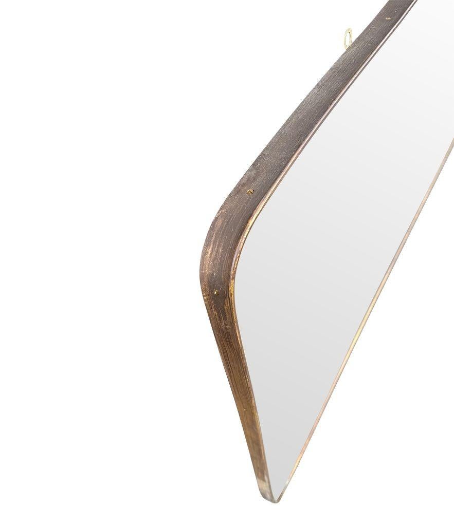 A large orignal 1950s Italian brass framed landscape mirror with curved corners For Sale 7