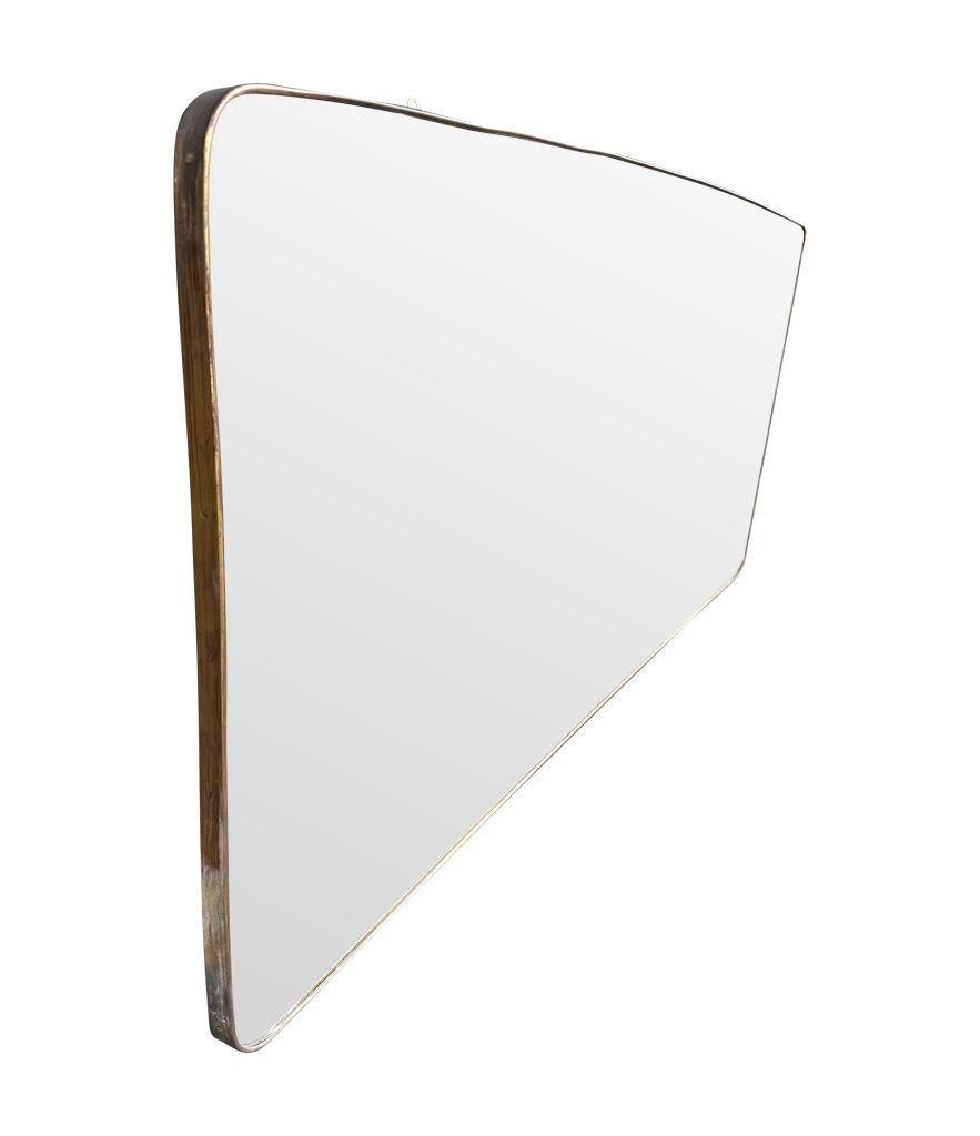 A large orignal 1950s Italian brass framed landscape mirror with curved corners In Good Condition For Sale In London, GB