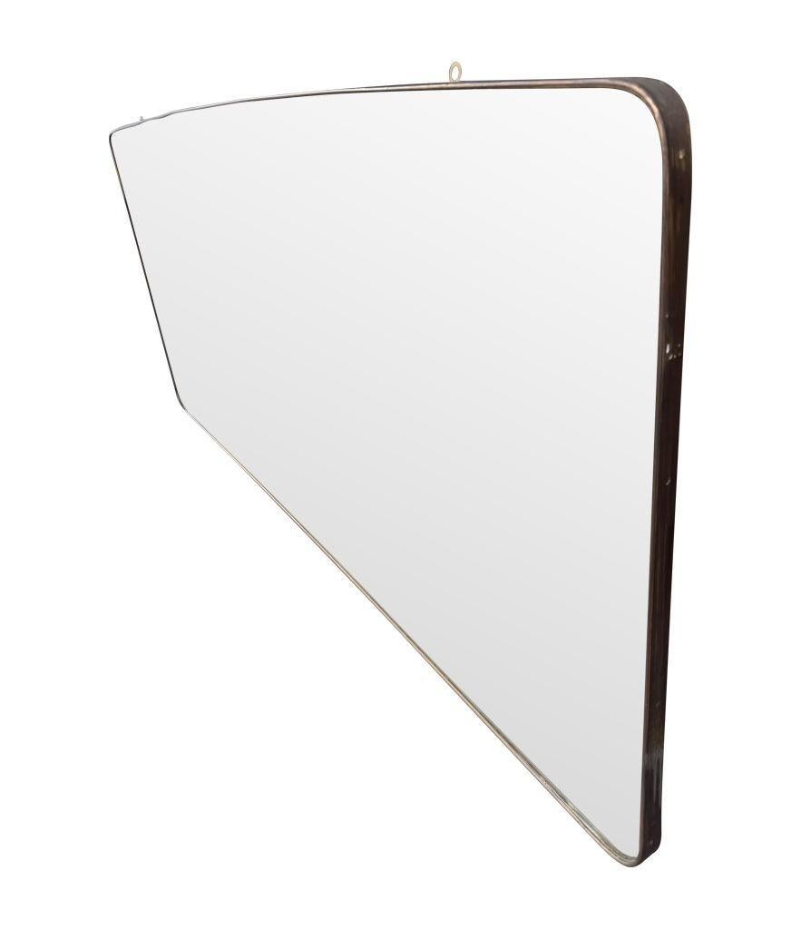 A large orignal 1950s Italian brass framed landscape mirror with curved corners For Sale 1