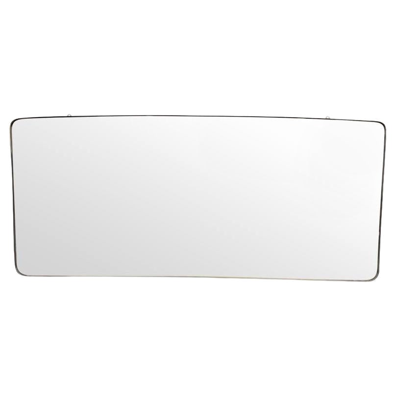A large orignal 1950s Italian brass framed landscape mirror with curved corners For Sale