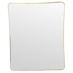 A large orignal 1950s Italian brass framed mirror with wide proportions