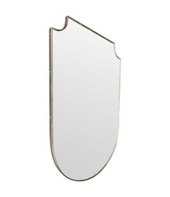 A large orignal 1950s Italian shield mirror with orignal mirror plate