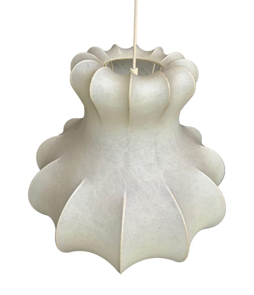 A large orignal 1960s cocoon light by Achille Castiglioni with wonderful organic shape. Produced by Italian company Flos rewired with new fittings and white cord flex. Height is with flex, height of shade is 40cm.