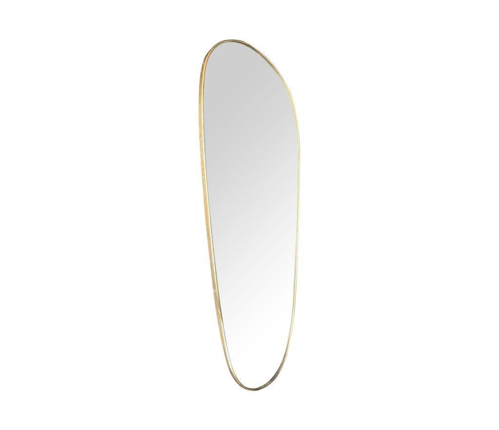 An orignal 1960s Italian shield mirror with lovely oval shaped brass frame and orignal plate.