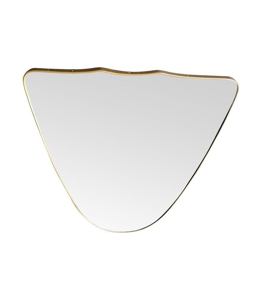 A large orignal Italian 1950s shield mirror with brass frame For Sale 2